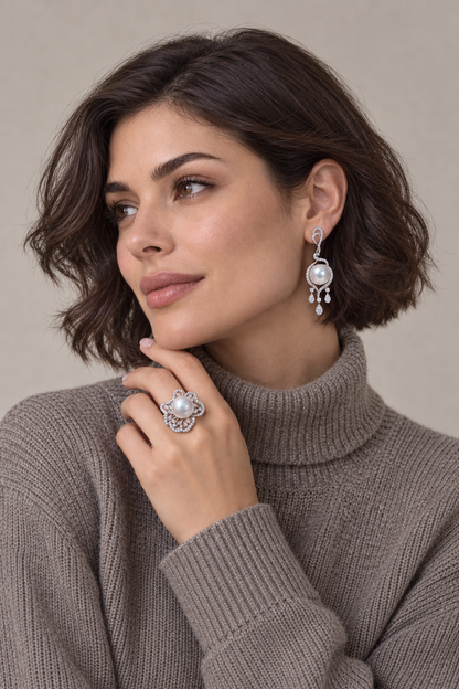Close view of the set worn showing 11–12mm White South Sea pearl ring and halo tassel stud earrings