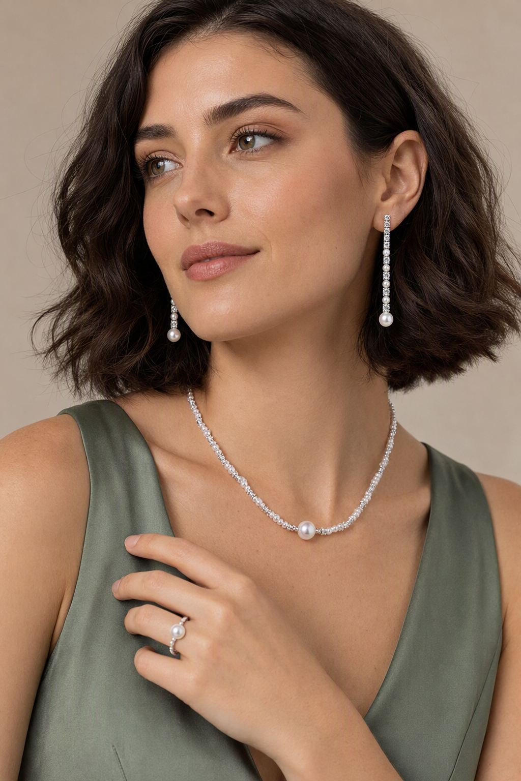 Close view of the White Freshwater Pearl Necklace & Earrings Set worn together, necklace at collarbone and meteor earrings visible