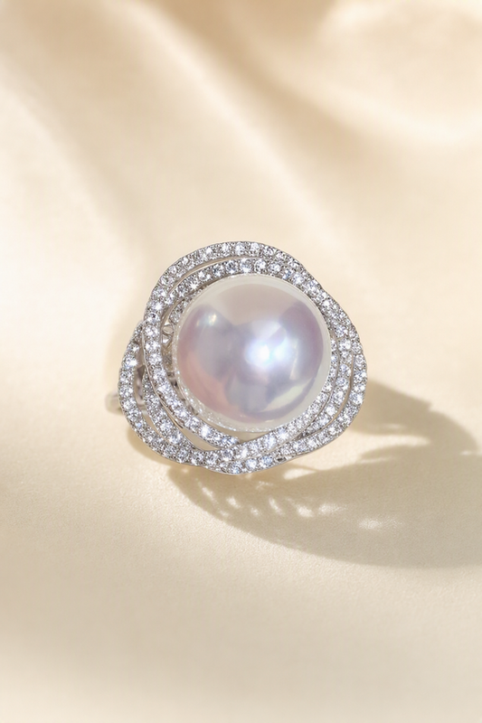 11–12mm White South Sea Pearl Double Halo Sterling Silver Ring on a cream white primary background