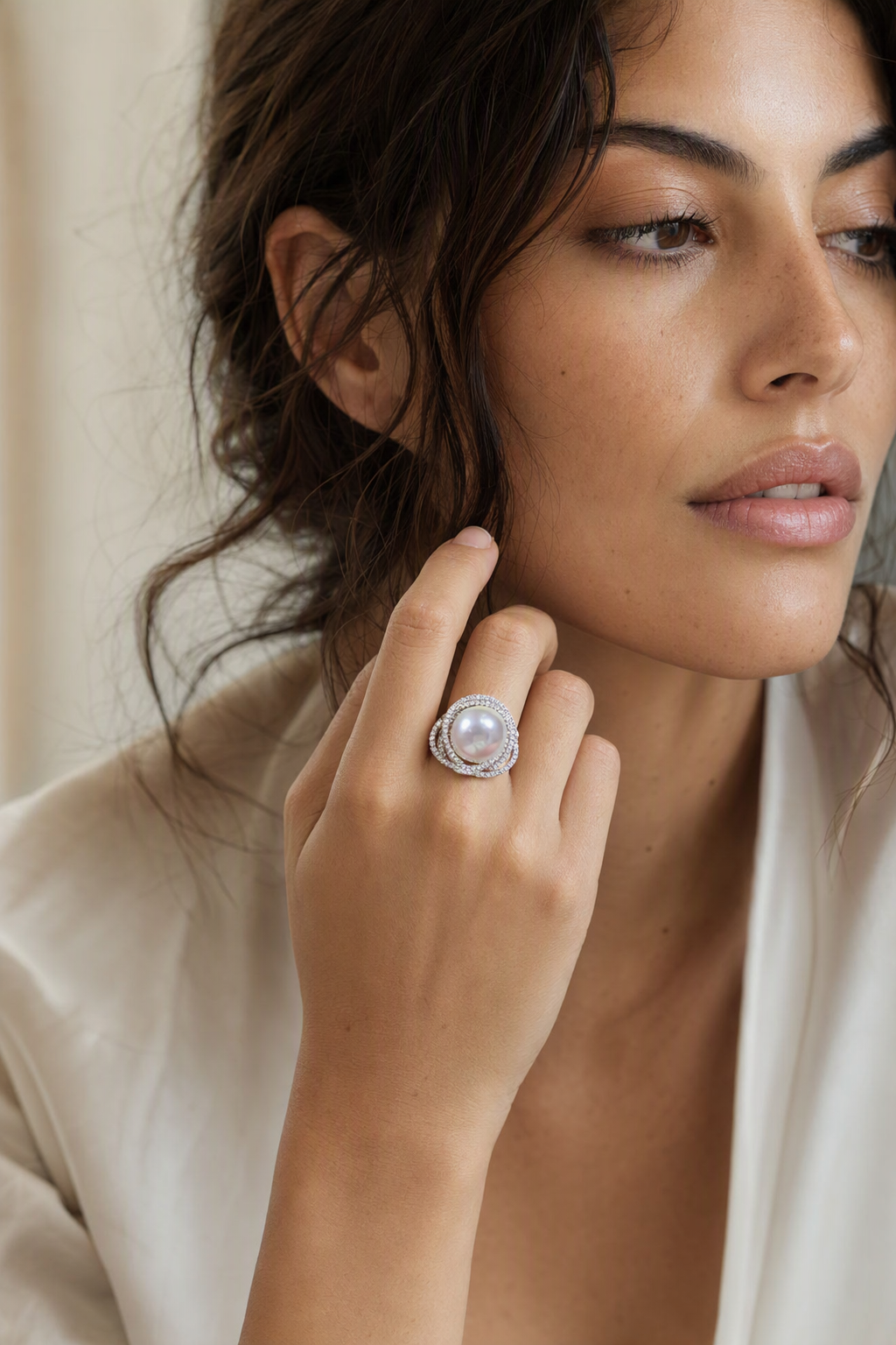 11–12mm White South Sea Pearl Double Halo Sterling Silver Ring naturally worn on the finger by a model