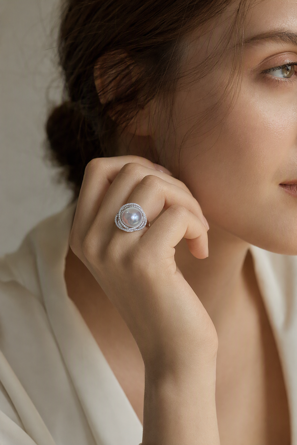 11–12mm White South Sea Pearl Double Halo Sterling Silver Ring at realistic wearing scale with confirmed pearl size