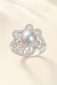 11–12mm White South Sea Pearl Floral Halo Sterling Silver Ring on a cream white primary background
