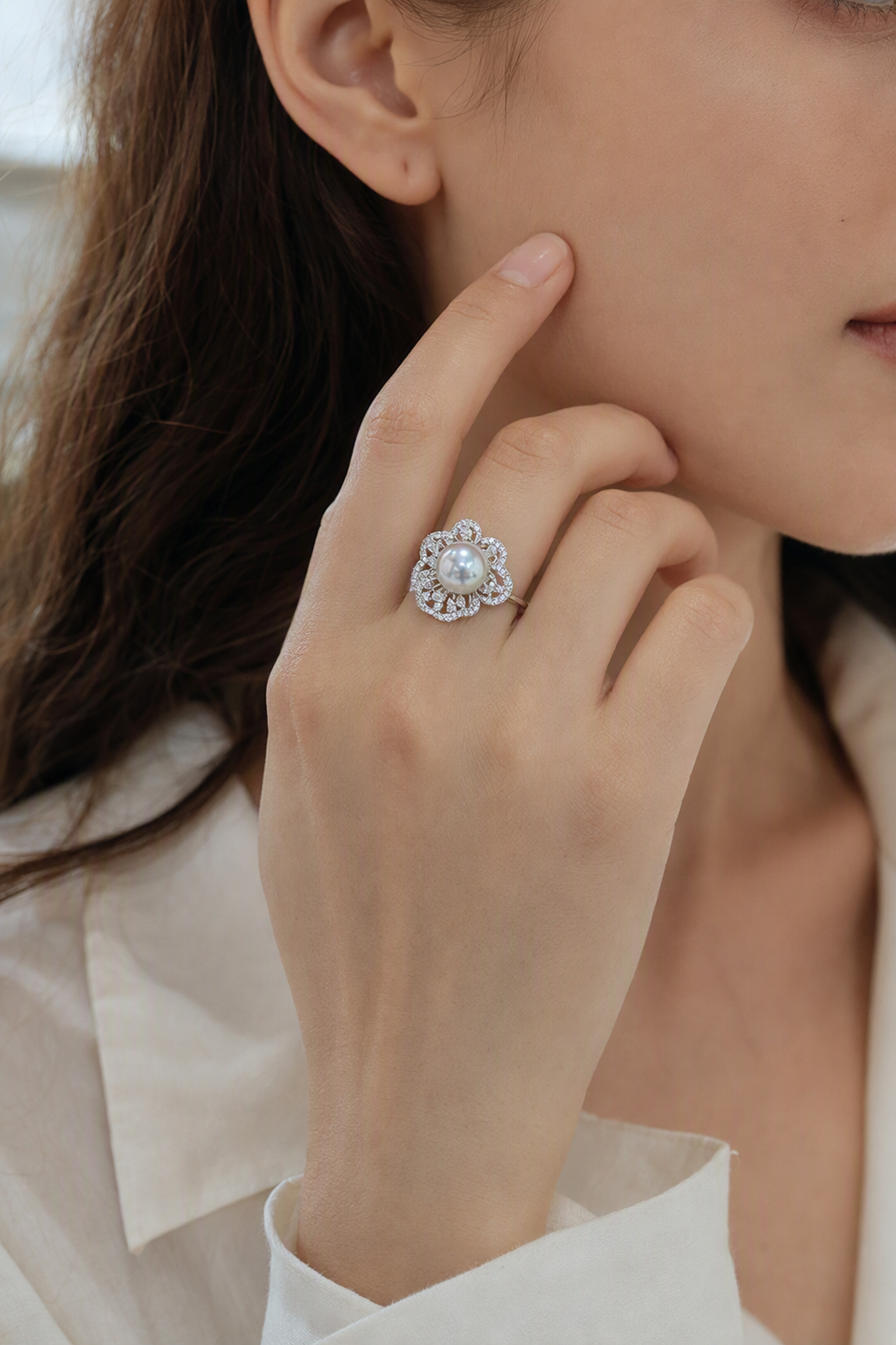 11–12mm White South Sea Pearl Floral Halo Sterling Silver Ring at realistic wearing scale with confirmed pearl size
