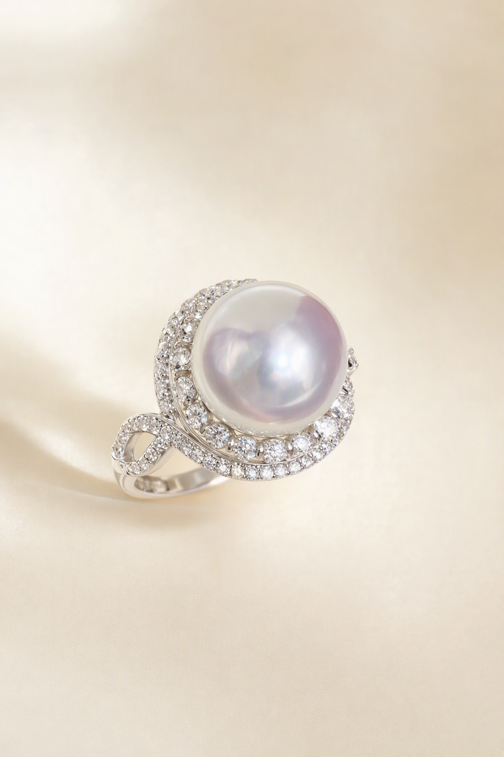 11–12mm White South Sea Pearl Leaf Wrap Sterling Silver Ring on a cream white primary background