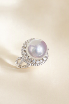 11–12mm White South Sea Pearl Leaf Wrap Sterling Silver Ring on a cream white primary background