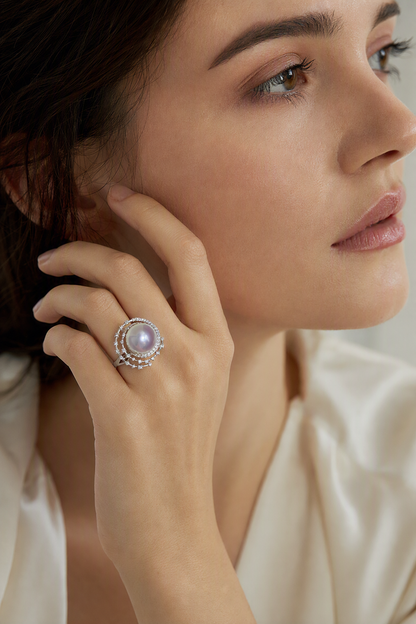 11–12mm White South Sea Pearl Open Halo Sterling Silver Ring at realistic wearing scale with confirmed pearl size