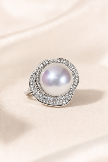 11–12mm White South Sea Pearl Organic Frame Sterling Silver Ring on a cream white primary background