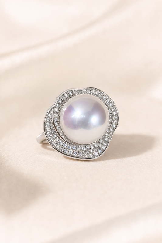 11–12mm White South Sea Pearl Organic Frame Sterling Silver Ring on a cream white primary background