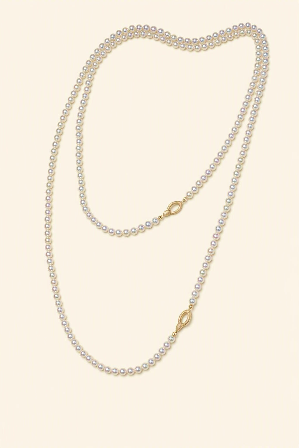 High Luster 4.5–5 mm Cultured Freshwater Pearl necklace on a cream white background