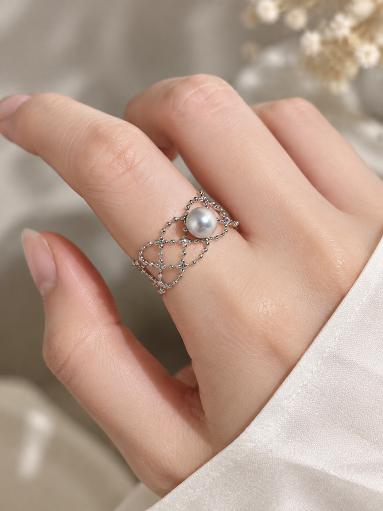Madama Aurora Luster 5-6mm Lace Weave Ring worn on a finger — Lifestyle Wearing