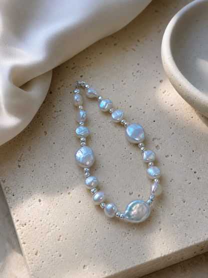 Freshwater baroque pearl bracelet featuring 6-10mm aurora pearls with mirror-like luster