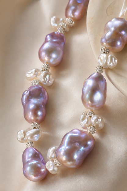 Close-up of Aurora Luster 20mm+ Freshwater Pearl necklace and earrings set showing pearl luster, nacre and craftsmanship detail