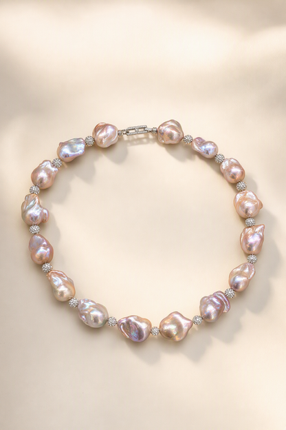 Aurora Luster Freshwater Pearl necklace on a cream white background