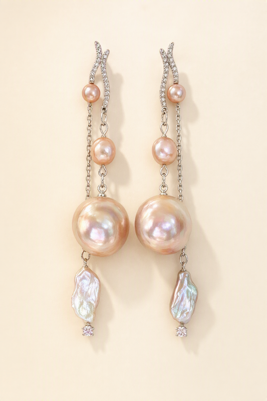 High Luster Freshwater Pearl dangle earrings on a cream white background