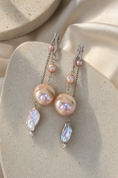 High Luster Freshwater Pearl dangle earrings in an elegant still-life luxury setting