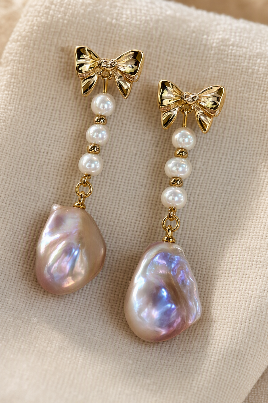 Close-up of High Luster Freshwater Pearl drop earrings showing pearl luster, nacre and craftsmanship detail
