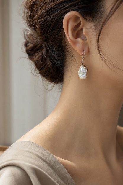 High Luster Freshwater Pearl drop earrings at realistic wearing scale