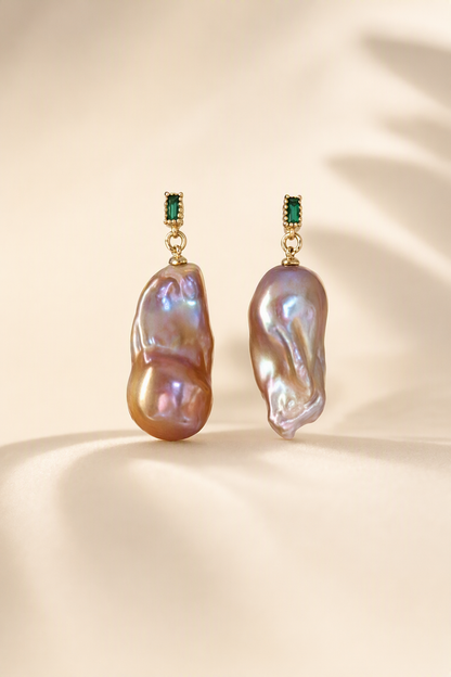 High Luster Freshwater Pearl drop earrings on a cream white background