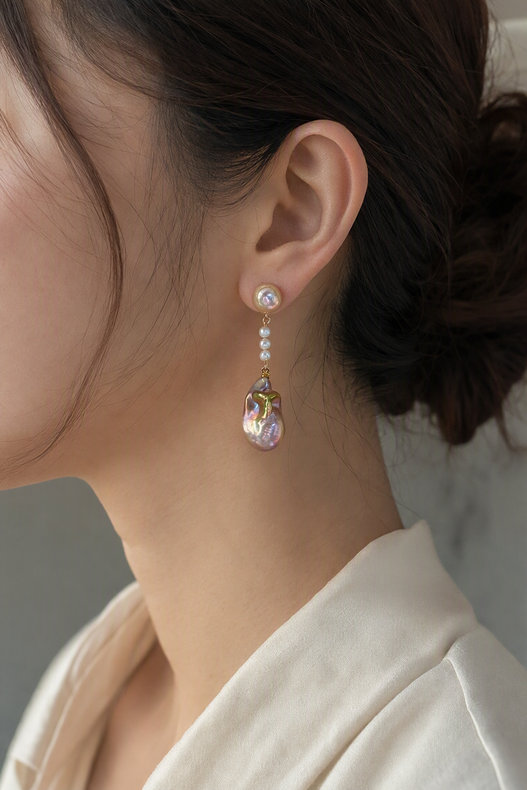 High Luster Freshwater Pearl drop earrings at realistic wearing scale