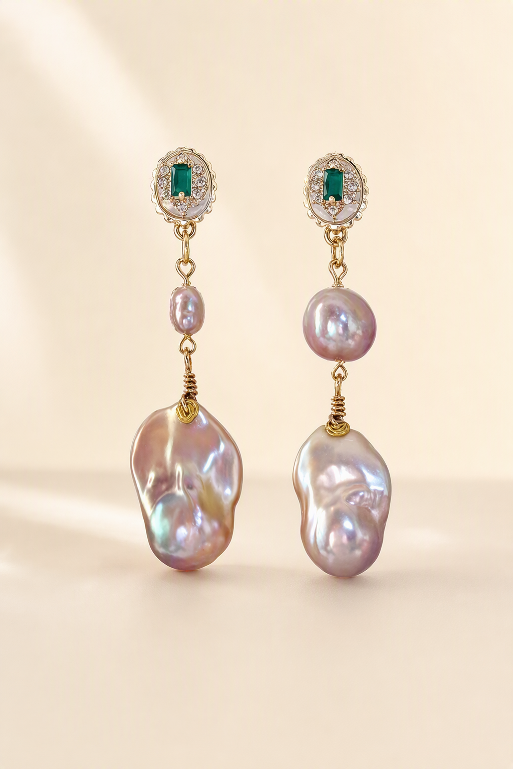 High Luster Freshwater Pearl drop earrings on a cream white background