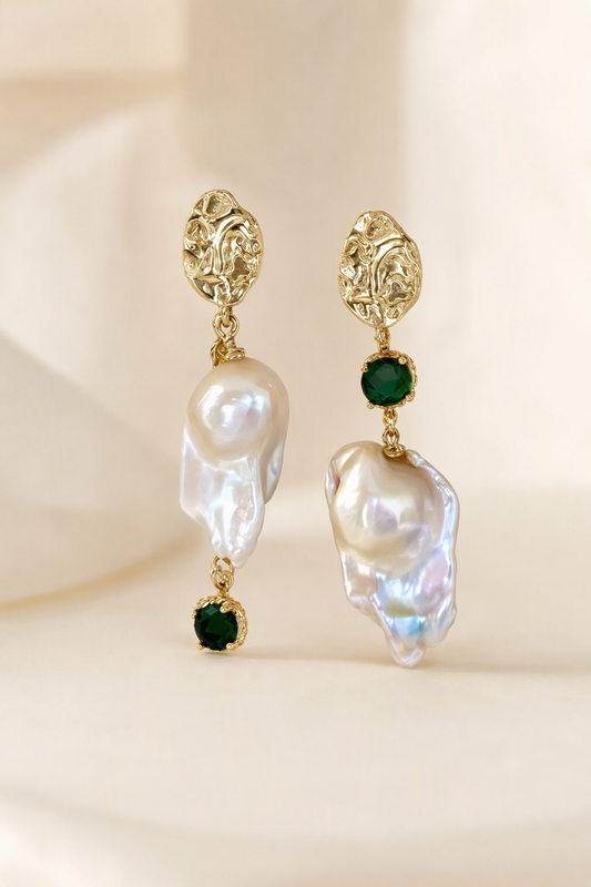 High Luster Freshwater Pearl drop earrings on a cream white background