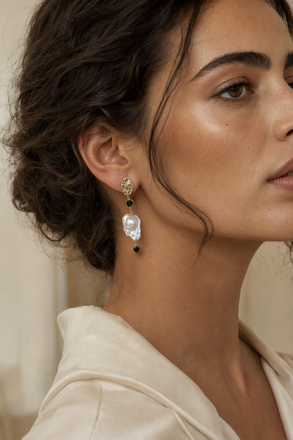 Model wearing High Luster Freshwater Pearl drop earrings naturally on the earlobe