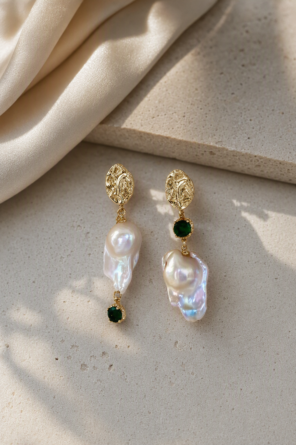 High Luster Freshwater Pearl drop earrings in an elegant still-life luxury setting