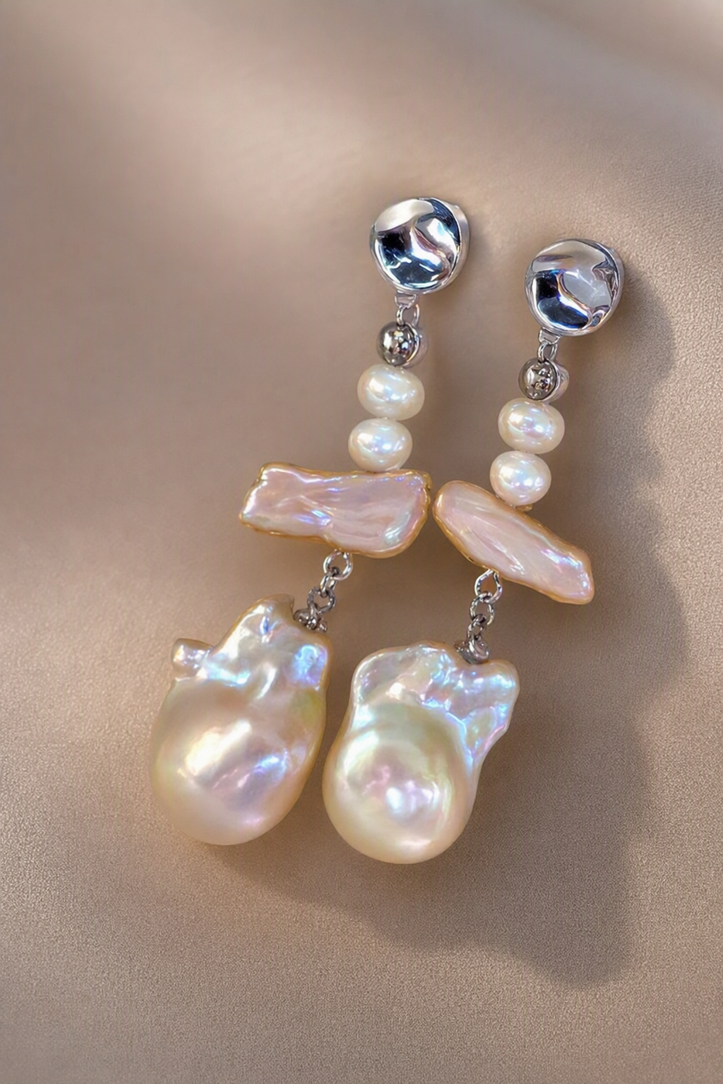 Close-up of High Luster Freshwater Pearl dangle earrings showing pearl luster, nacre and craftsmanship detail