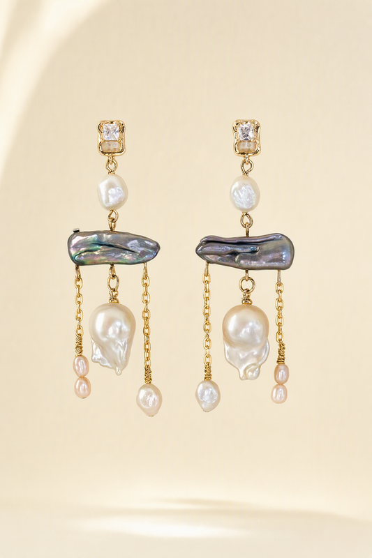 High Luster Freshwater Pearl dangle earrings on a cream white background