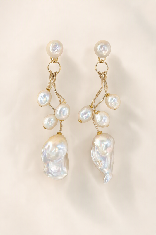 High Luster Freshwater Pearl drop earrings on a cream white background