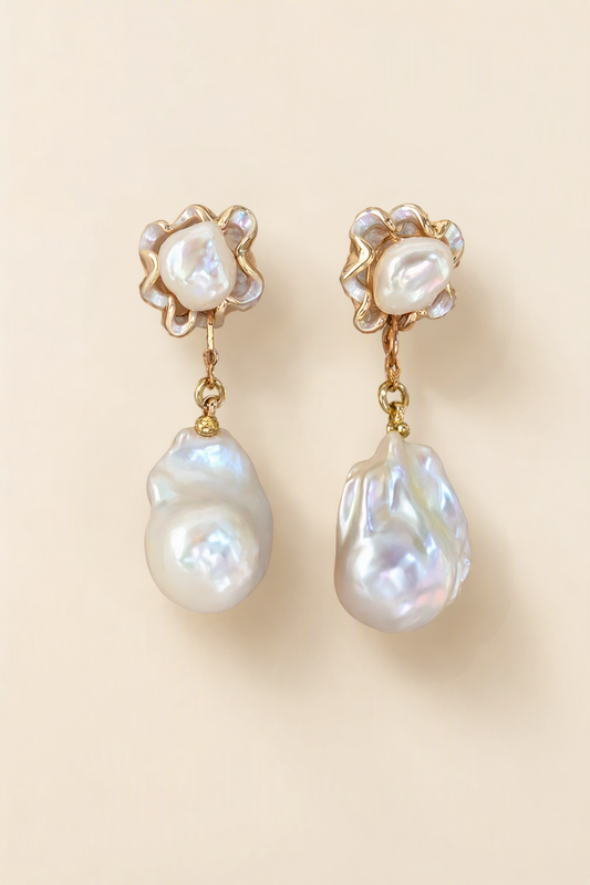 High Luster Freshwater Pearl drop earrings on a cream white background