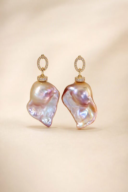 High Luster Freshwater Pearl drop earrings on a cream white background