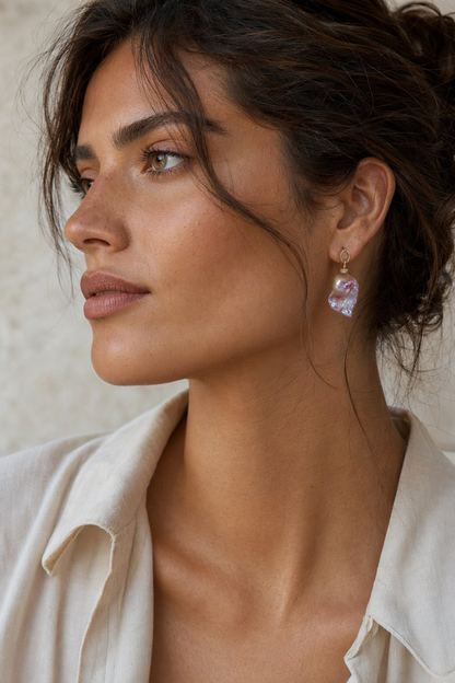 Model wearing High Luster Freshwater Pearl drop earrings naturally on the earlobe