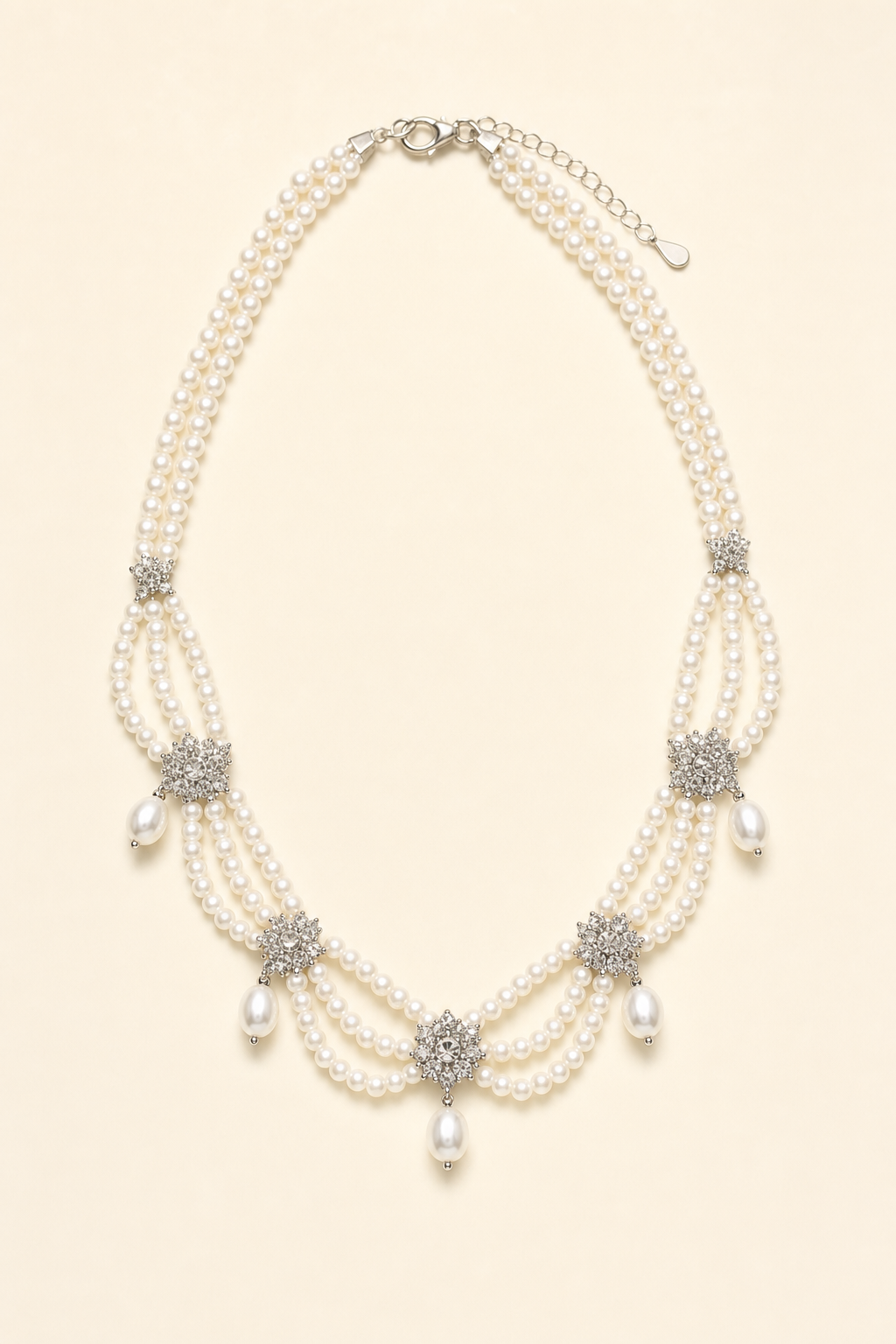 Mirror Luster 3–4 mm / 6–10 mm Freshwater Pearl necklace on a cream white background