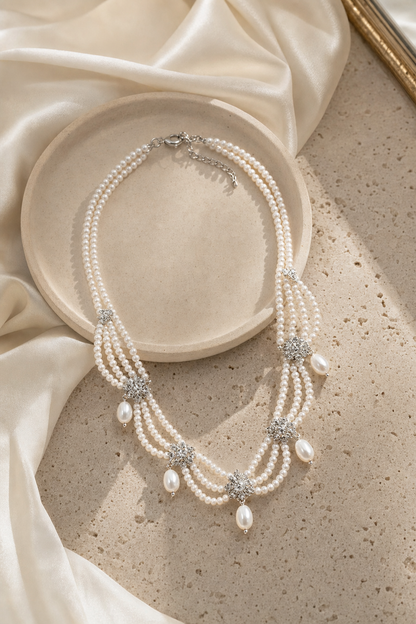 Mirror Luster 3–4 mm / 6–10 mm Freshwater Pearl necklace in an elegant still-life luxury setting