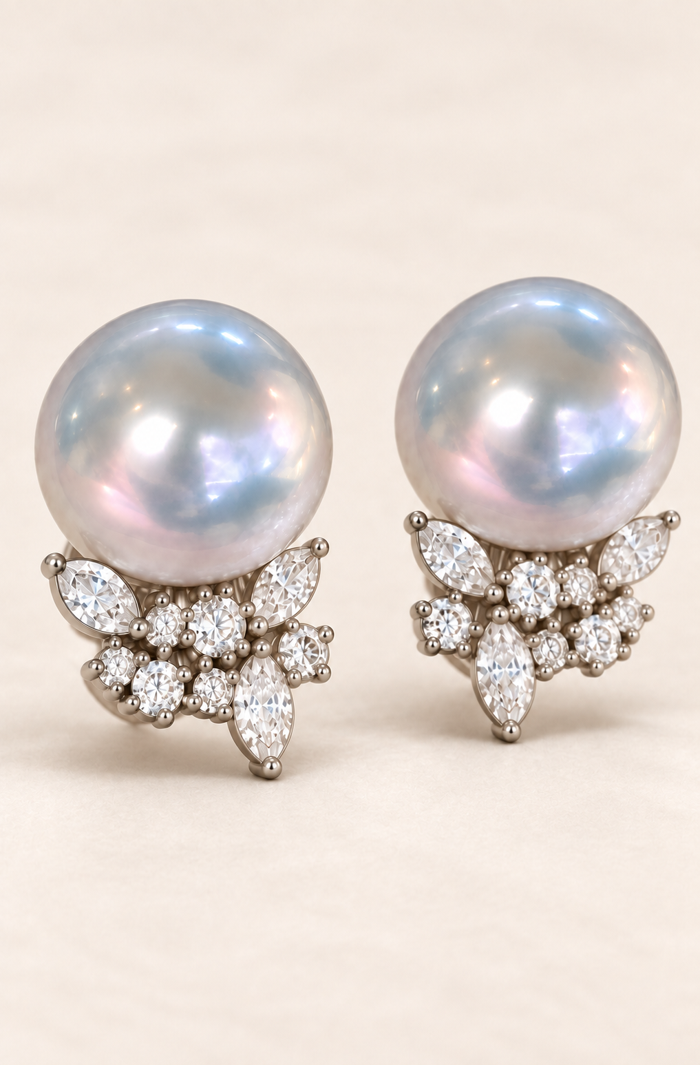 Close-up of Gem Luster 11–13 mm Australian South Sea Pearl stud earrings showing pearl luster, nacre and craftsmanship detail