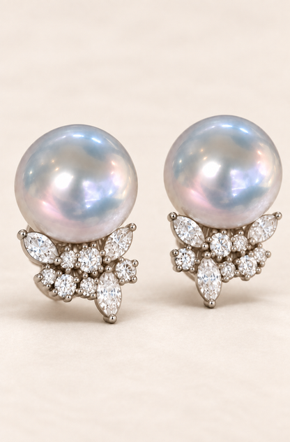 Close-up of Gem Luster 11–13 mm Australian South Sea Pearl stud earrings showing pearl luster, nacre and craftsmanship detail