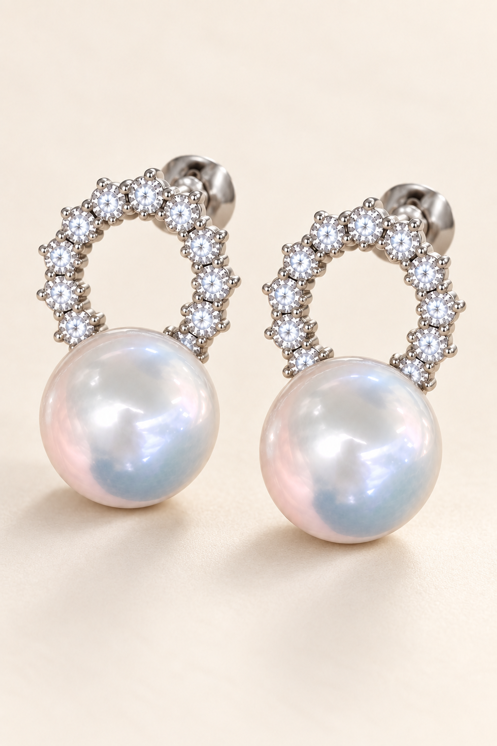 Close-up of Gem Luster 11–13 mm Australian South Sea Pearl stud earrings showing pearl luster, nacre and craftsmanship detail