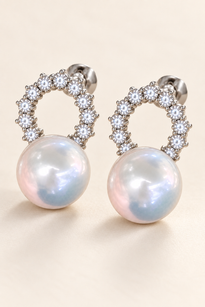 Close-up of Gem Luster 11–13 mm Australian South Sea Pearl stud earrings showing pearl luster, nacre and craftsmanship detail
