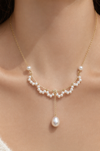 Close-up of Mirror Luster 2–3 mm fringe pearls; 4–5 mm side pearls; 6–9 mm teardrop focal pearl Freshwater Pearl necklace showing pearl luster, nacre and craftsmanship detail