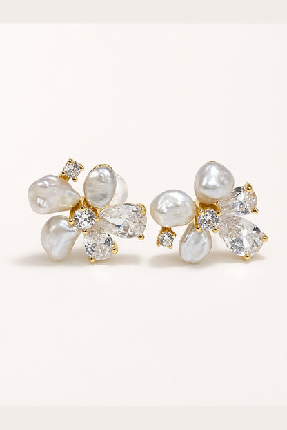 Freshwater keshi pearl flower stud earrings with mirror-like luster on white background