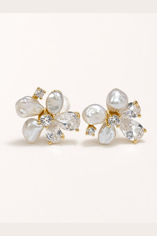 Freshwater keshi pearl flower stud earrings with mirror-like luster on white background