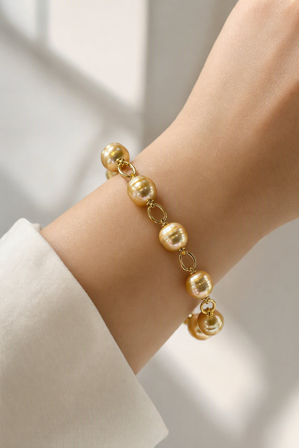 Golden South Sea Pearl Necklace Bracelet and Earrings Set — wearing scale view