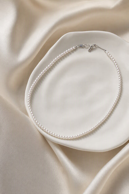 Close-up of Mirror Luster 2–3mm Cultured Freshwater Pearl necklace showing pearl luster, nacre and craftsmanship detail