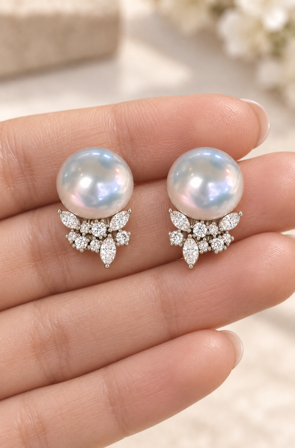 Gem Luster 11–13 mm Australian South Sea Pearl stud earrings in an elegant still-life luxury setting