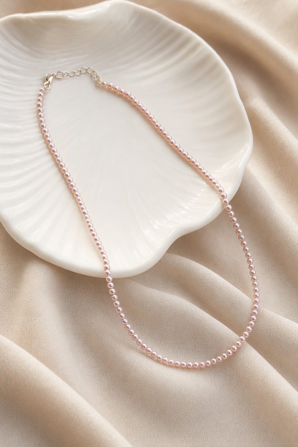 Mirror Luster 2–3mm Cultured Freshwater Pearl necklace at realistic wearing scale