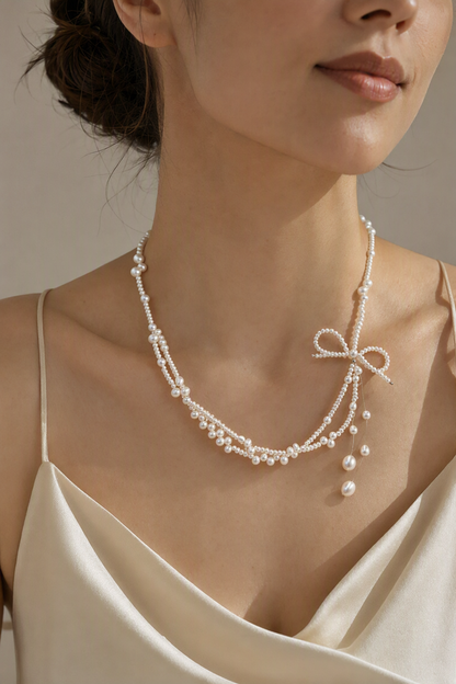 Model wearing 3–4 mm and 5–6 mm Freshwater Pearl necklace naturally at the neckline