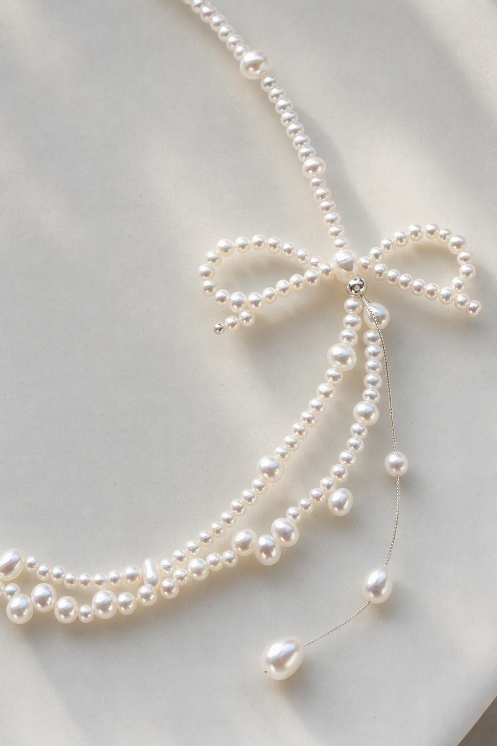 Close-up of 3–4 mm and 5–6 mm Freshwater Pearl necklace showing pearl luster, nacre and craftsmanship detail