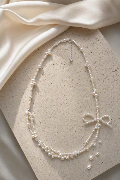 3–4 mm and 5–6 mm Freshwater Pearl necklace in an elegant still-life luxury setting