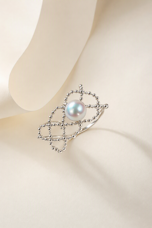 Aurora Luster 5-6mm ring on a cream white background